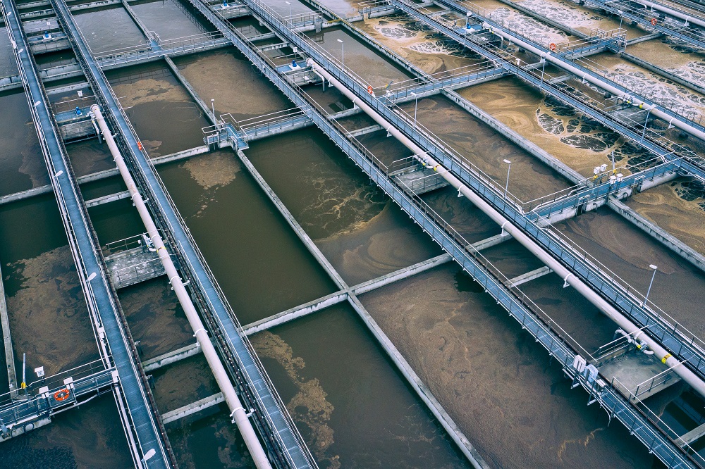 Sewage Farm Aerial View. Clarifying tanks and green grass. Top v
